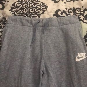 Girls Nike joggers.